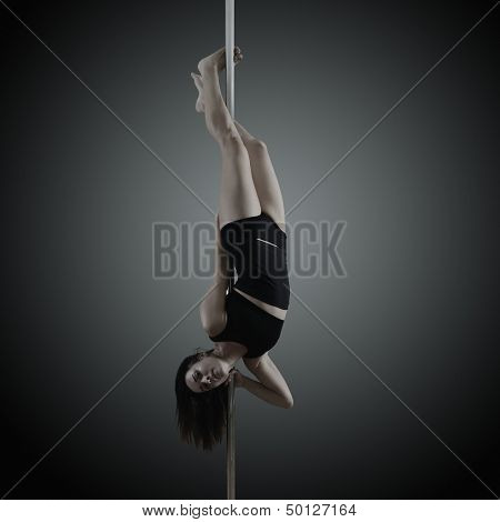 pole dancer, young woman dancing on pylon, toned and noise added