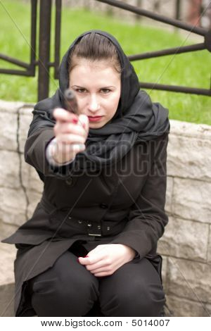 Vrouw met pistool