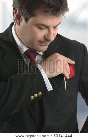Man Businessman Holding Credit Card Or Other Plastic Card