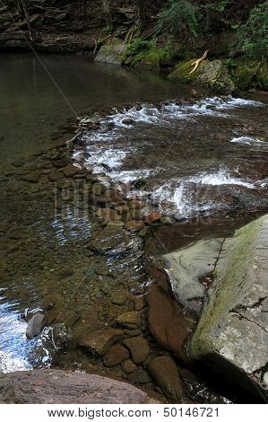 Mountain river with blue clean water and stones at Catskils mountains upstate NY