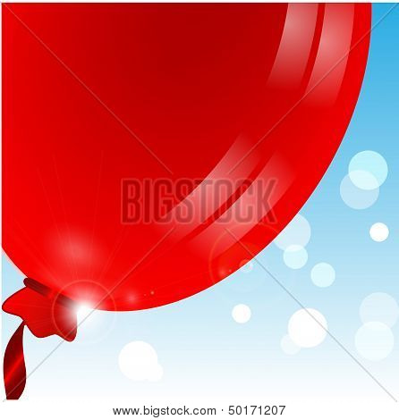 balloon of red color on a blue background