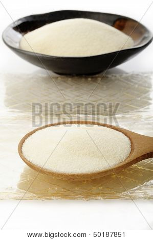 Gelatin Granules And Gelatin Sheet  On White