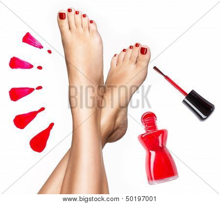 Beautiful Female Legs With Red Pedicure And  Nail Polish