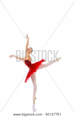 Professional ballet dancer posing at studio. Isolated over white background. 