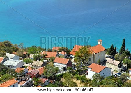 Beach And Turquoise Sea Water