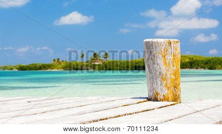 Wooden Pier On Tropical Island