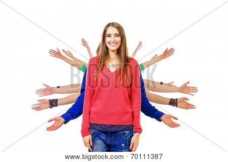Large group of cheerful young people standing one after another holding hands at the side. Isolated over white.