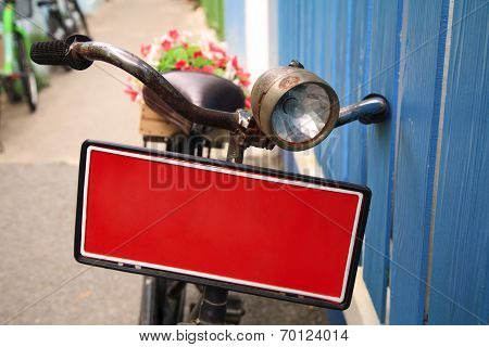 Bicycle With Red Banner Carrying Flowers Pot