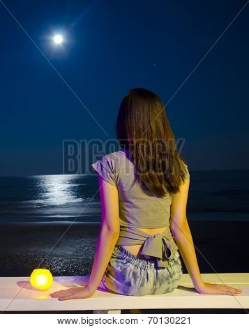Girl Sitting on the beach