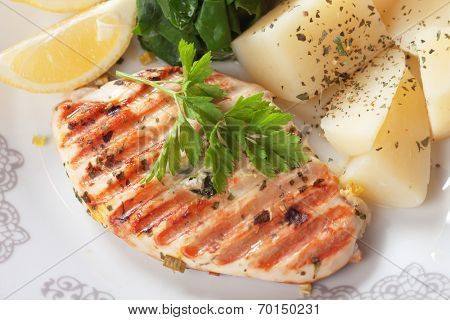 Grilled chicken breast with boiled potato and chard