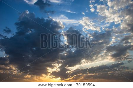 Cloudscape With The Sun Rays Radiating From Behind The Cloud