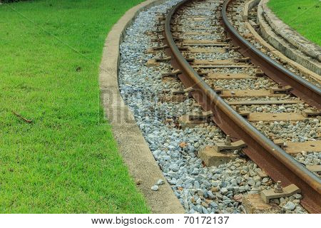 Railway And Grass Beside