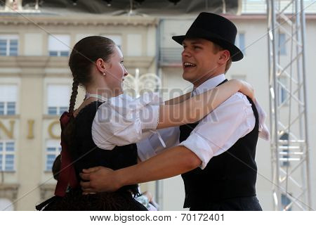 ZAGREB, CROATIA - JULY 19: Members of folk groups Nograd  from Salgotarjan, Hungary during the 48th International Folklore Festival in center of Zagreb, Croatia on July 19, 2014