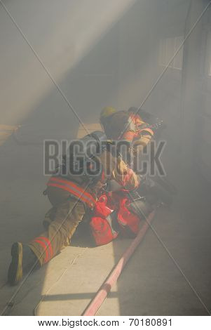 Firefigher And Smoke