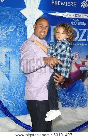 LOS ANGELES - NOV 19: Hank Baskett, Hank Baskett IV at the premiere of Walt Disney Animation Studios' 'Frozen' at the El Capitan Theater on November 19, 2013 in Los Angeles, CA