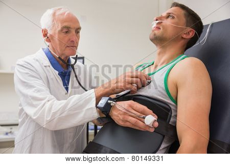 Man strapped to gurney to find out his BMR at the medical centre