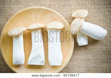 King Oyster Mushrooms (pleurotus Eryngi) In Wooden Dish.