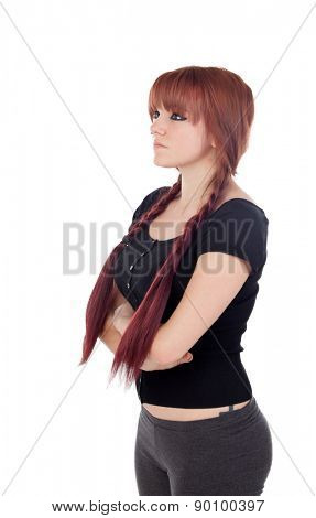 Angry teenage girl dressed in black with a piercing isolated on white background