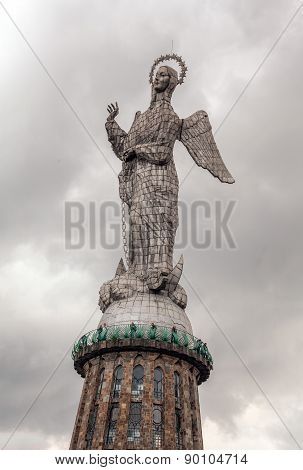 Tall Stone Monument Of A Madonna Which Was Assembled On A High Pedestal On The Top Of Panecillo, Ecuador