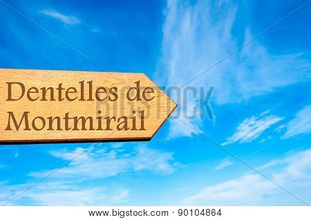 Wooden arrow sign pointing touristic destination