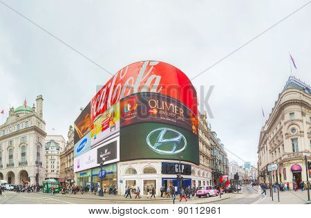Piccadilly Circus Junction Crowded By People In London