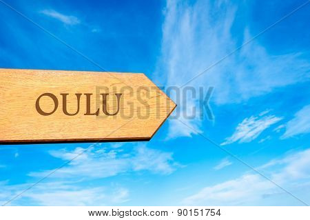 Wooden arrow sign pointing touristic destination