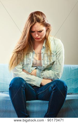 Girl Suffering From Stomach Pain