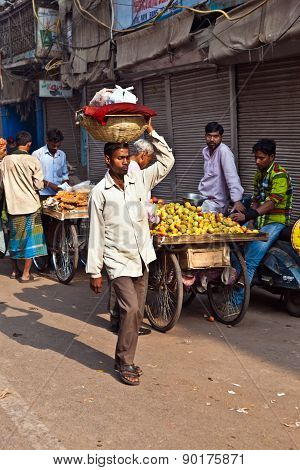 Man Carrying Goods On His Head At Chawri Bazar In Delhi, India