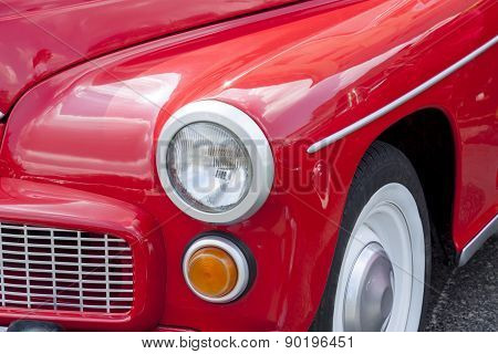 View on Front of red old car.