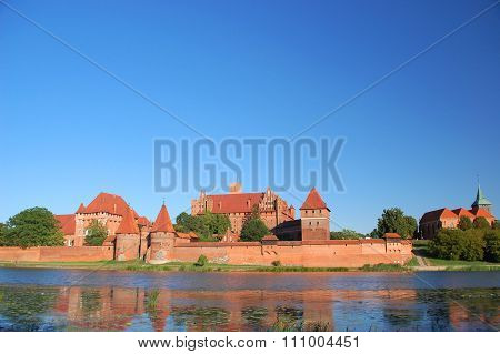 Picturesque scene of Malbork castle on Nogat river in Poland