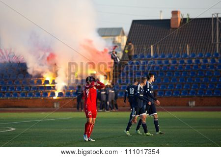 Background Of Fans On Tribune With Fires