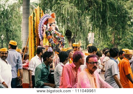 People carrying Hindu God Idol.