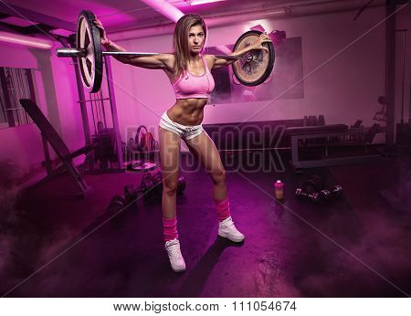 Sexy Woman Doing Squat Workout In Gym
