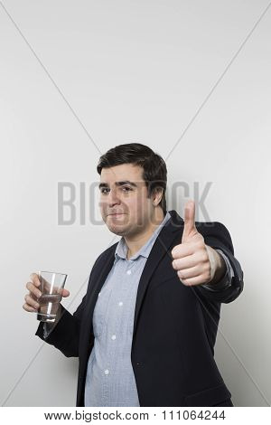 happy businessman drinking water