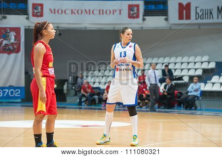MOSCOW -- DECEMBER 4, 2014: Irina Sokolovskaya (13) in action during the International Europe bascketball league match Dynamo Moscow vs Maccabi Ashdod Israel in sport palace Krilatskoe, Moscow, Russia. Dynamo loss 59:67