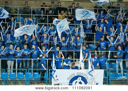 MOSCOW RUSSIA - DECEMBER 2, 2015: Fans of Dynamo Moscow during the game on women's Rissian volleyball Championship game Dynamo (MSC) vs Dynamo (KZN) at the Luzhniki stadium in Moscow Russia. Kazan won in serie 3: 2