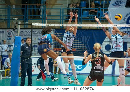 MOSCOW RUSSIA - DECEMBER 2, 2015: Unidentified players in action during the game on women's Rissian volleyball Championship game Dynamo (MSC) vs Dynamo (KZN) at the Luzhniki stadium in Moscow Russia. Kazan won in serie 3: 2