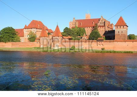 Picturesque scene of Malbork castle on Nogat river in Poland