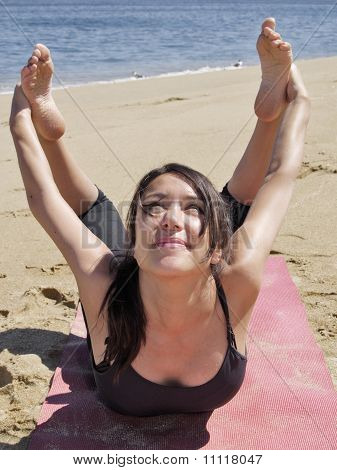 Bikram Yoga Dhanurasana Pose At Beach