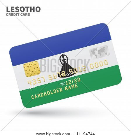 Credit card with Lesotho flag background for bank, presentations and business. Isolated on white