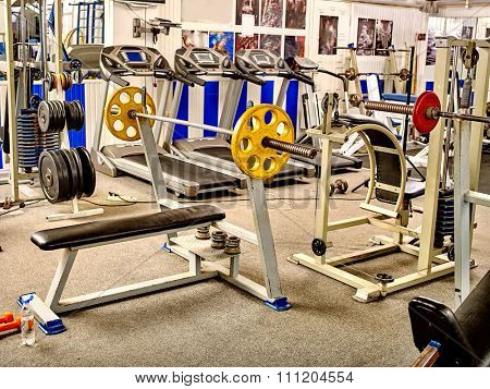 Sport gym interior with treadmill equipment.