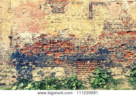 Old And Cracky Brick Wall. Grunge Background