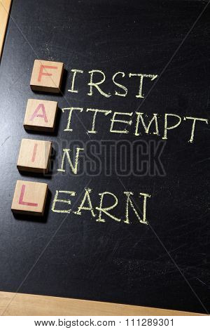 Business Acronym FAIL as first attempt in learn on blackboard. motivational concept image