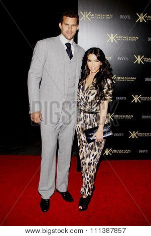 HOLLYWOOD, CALIFORNIA - Wednesday August 17, 2011. Kris Humphries and Kim Kardashian at the Kardashian Kollection Launch Party held at the Colony, Los Angeles. 