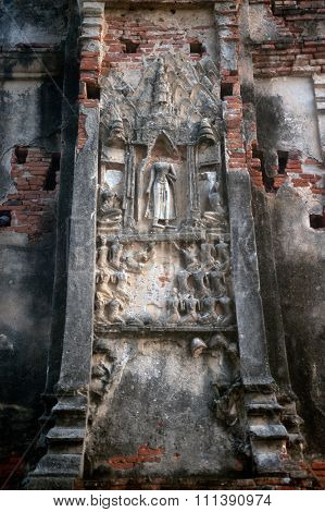 AYUTTHAYA,THAILAND-JAN 18,2015 : Ancient Thai art at Pagoda in Wat Chaiwatthanaram,The temple was construction in 1630,name literally means of long reign and glorious era,in Ayutthaya Historical Park,Ayutthaya ,Thailand.
