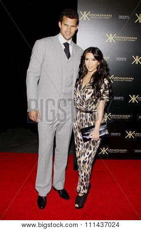 Kris Humphries and Kim Kardashian at the Kardashian Kollection Launch Party held at the Colony in Hollywood on August 17, 2011.