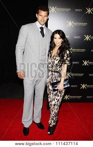 Kris Humphries and Kim Kardashian at the Kardashian Kollection Launch Party held at the Colony in Hollywood on August 17, 2011.