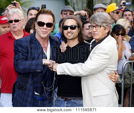 HOLLYWOOD, CA - OCTOBER 31, 2011: Eric Roberts and Keaton Simons at Mickey Rourke Hand And Footprint Ceremony held at Grauman's Chinese Theater in Hollywood, USA on October 31, 2011.