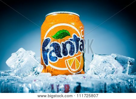 MOSCOW, RUSSIA-APRIL 4, 2014: Can of Coca Cola company soft drink Fanta Orange on ice. Fanta is a global brand of fruit-flavored carbonated soft drinks created by The Coca-Cola Company.