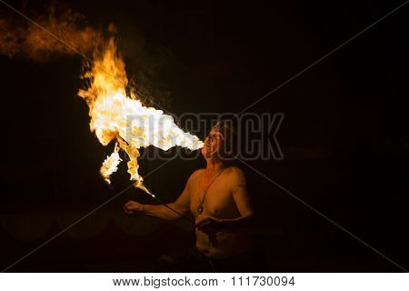 BRAGA, PORTUGAL - DECEMBER 13: Fire eater performing at Cardinali Circus on December 13, 2015 in Braga, Portugal.